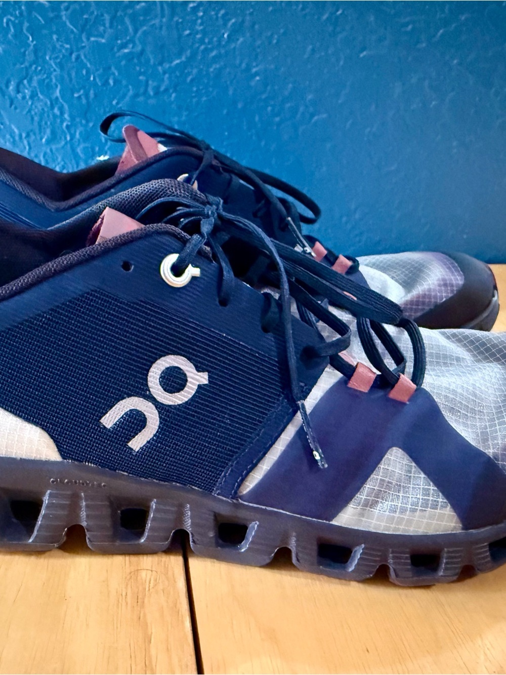 On Running Women's Navy Athletic Sneakers with Pink Accents